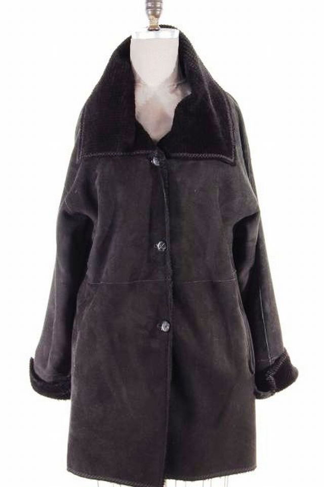 Wonderfully Warm and Light weight So Soft and Supple: Wonderfully Warm and Light weight So Soft and Supple Grooved Black Shearling Lamb Stroller. Size Large. Retail price of $3,980!