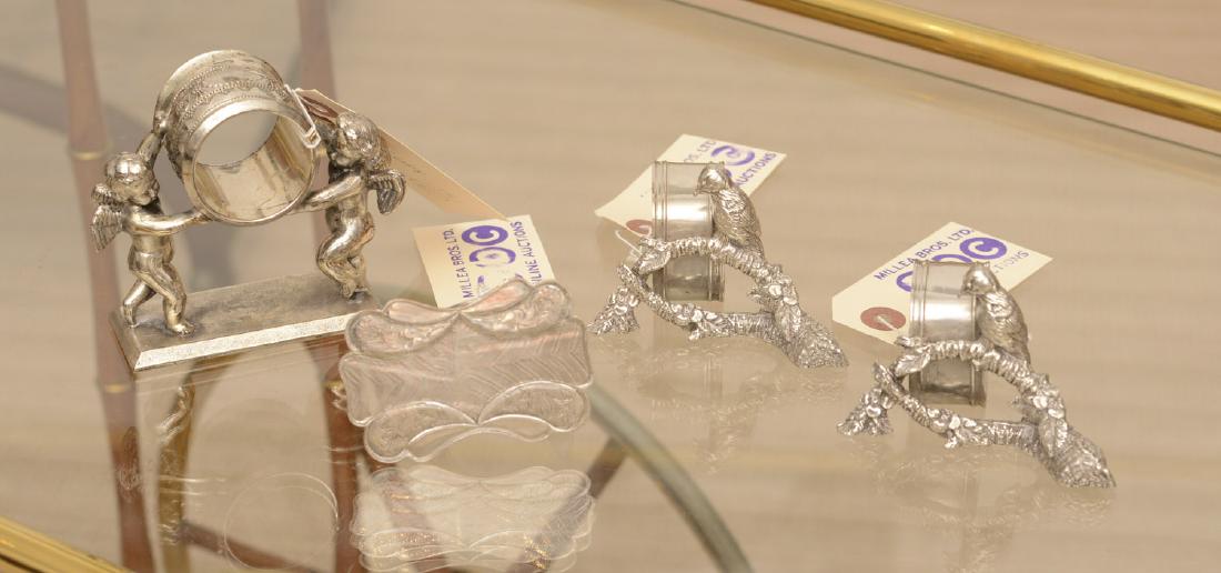 (4) American silver plate figural napkin rings (1 of 6)