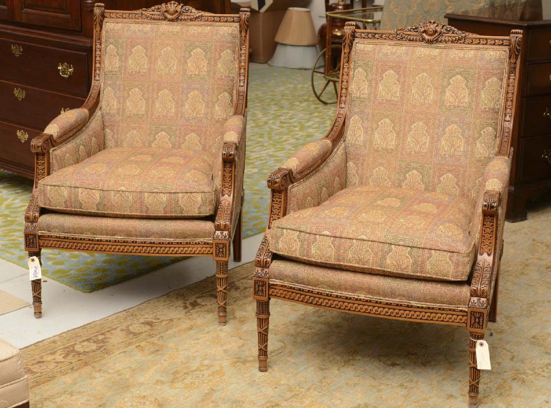 Pair Sherrill Louis XVI style carved bergeres: Pair Sherrill Louis XVI style carved bergeres, 21st c., floral and swag crest, nicely upholstered, 39.5"h x 27.5"w x 32"d