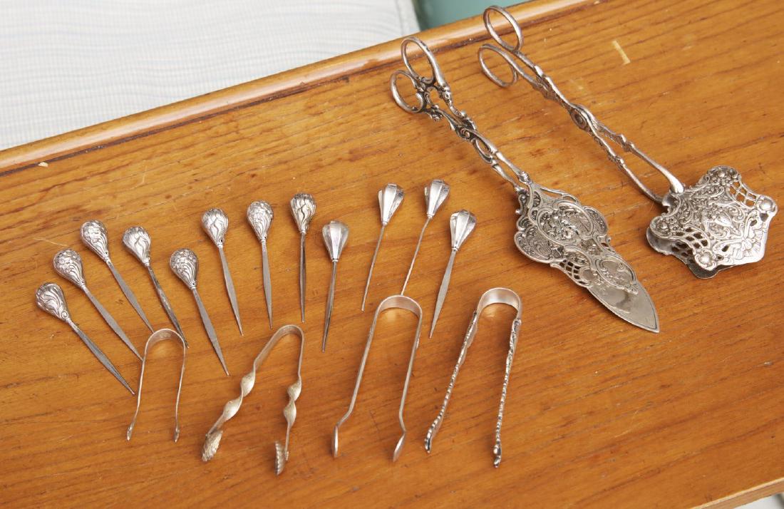 Group silver servers, tongs, and picks (1 of 5)