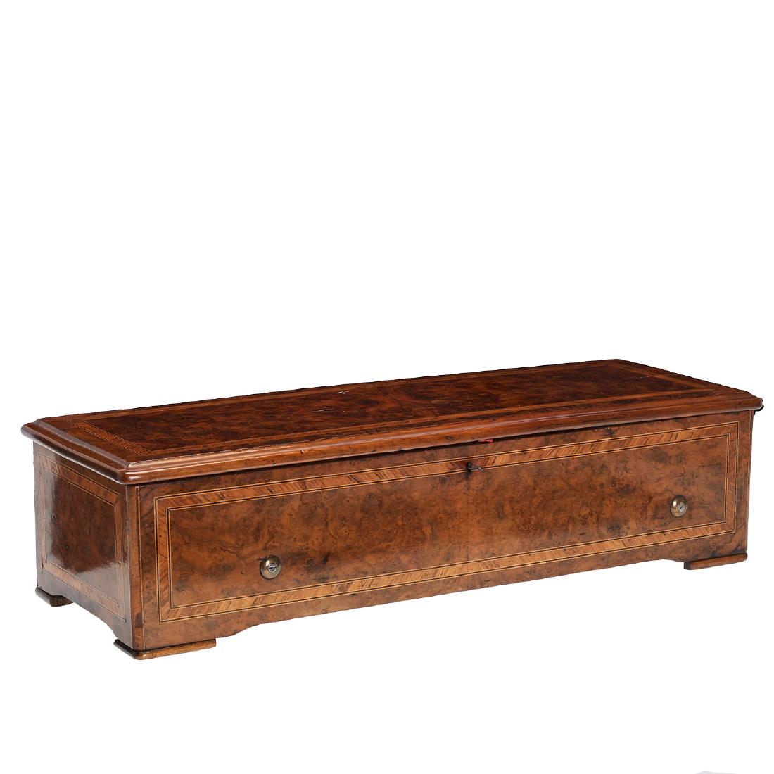 Antique Swiss cylinder music box: Antique Swiss cylinder music box, Late 19th c., 15-inch brass cylinder with single comb, burl inlaid casket, labeled "Fabrique de Genevie" with 12 aire song list and serial number, 6.5"h x 26"l x 9.5"