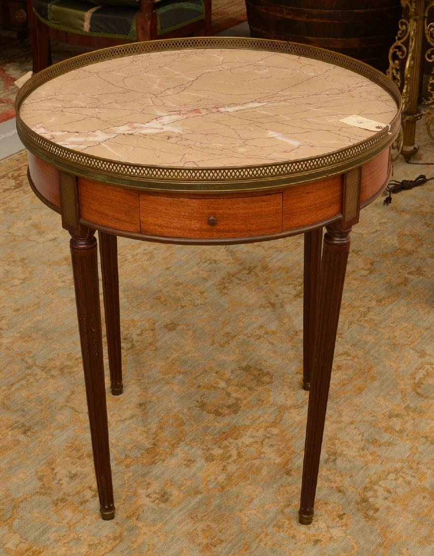 Louis XVI style marble top bouillotte table: Louis XVI style marble top bouillotte table, 19th/20th c., unmarked, 29.5"h x 26"dia. Provenance: Palmetto Hall: The Jay P. Altmayer Family Collection
