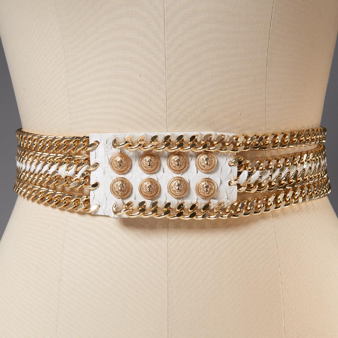 Balmain Paris white python and chain belt: Balmain Paris white python and chain belt, Early 2000's, Made in France, snap closure, gold polished metal, size 33, 32"l (total), 14"l (snapped) Provenance: From a New Canaan, CT single owner clothin