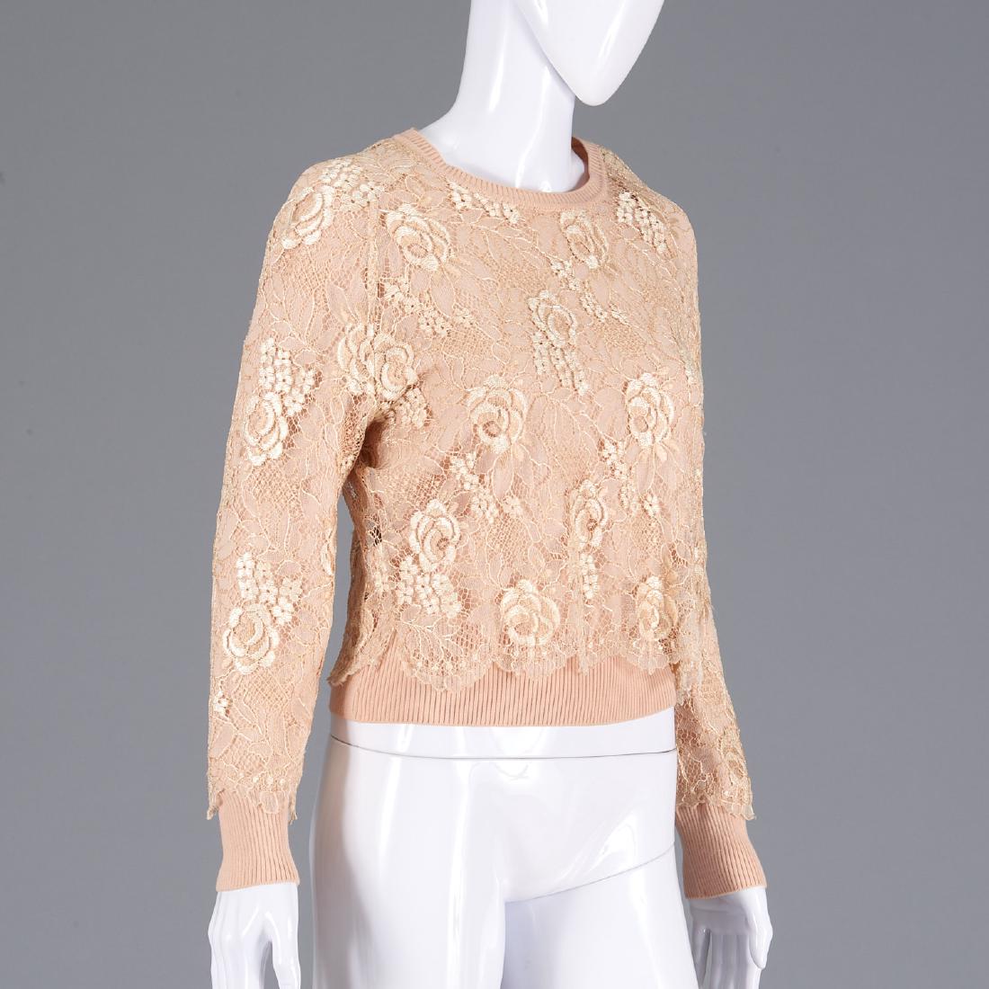 Givenchy couture lace wool sweater: Givenchy couture lace wool sweater, 1980's, peach sweater with ivory and peach lace overlay, , 33.5"b, 15"sh, 23"sl, 20"l Provenance: From a New York single owner clothing collection