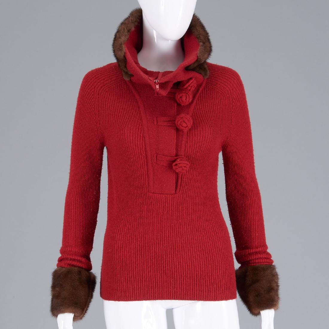 Oscar de la Renta red sweater with mink trim: Oscar de la Renta red sweater with mink trim, C. 1990's, for Bergdorf Goodman, wool/silk/cashmere blend, foldover neck with rosette closures, fur trim at neck and sleeves, 34"b, 15"sh, 27"sl, 24"l Pro