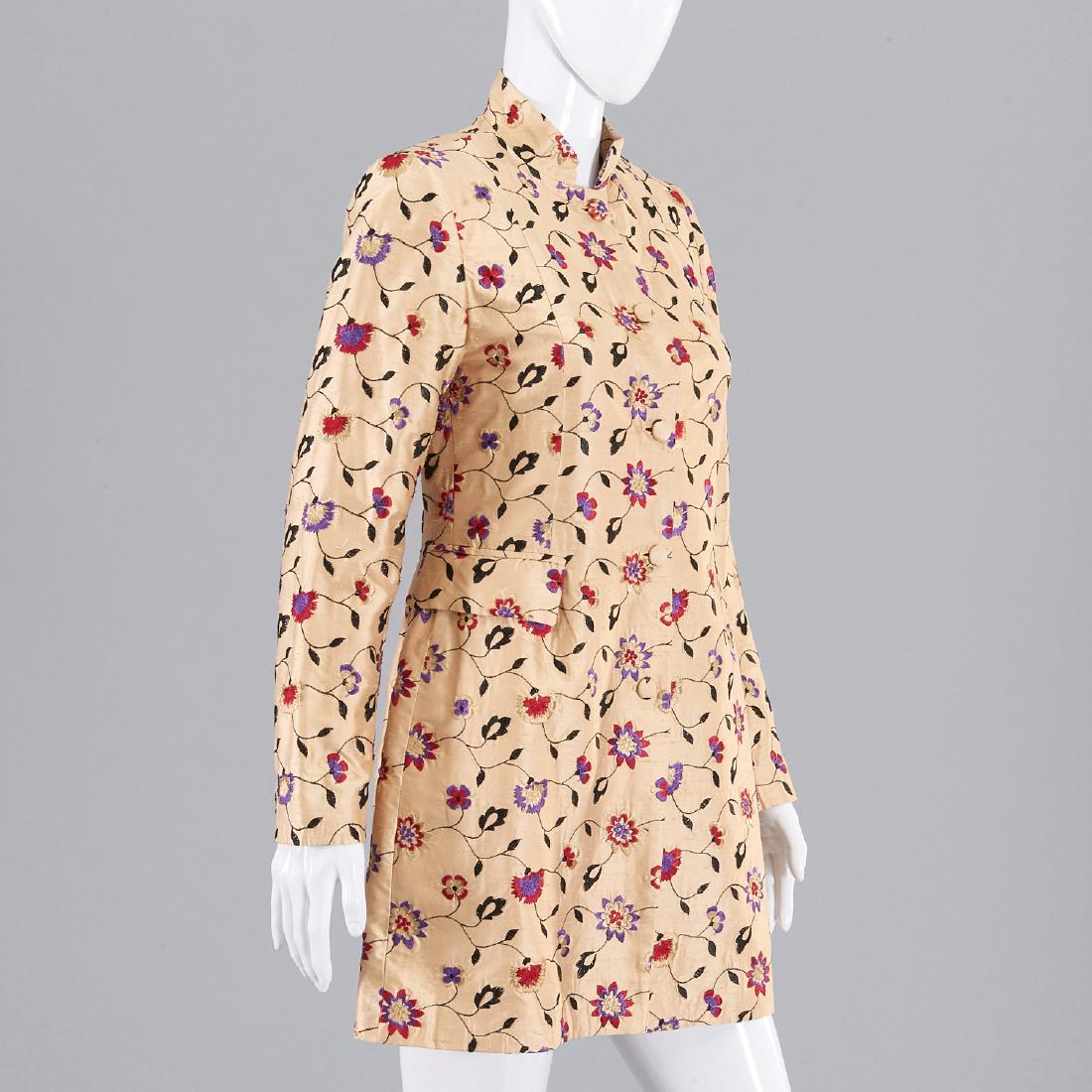 Favourbrook ladies embroidered silk coat: Favourbrook ladies embroidered silk coat, Early 2000's, Made in England for Saks Fifth Avenue, champagne raw silk with embroidered floral design, (2) pockets, stand up collar, fully lined, 34"b, 27"w,