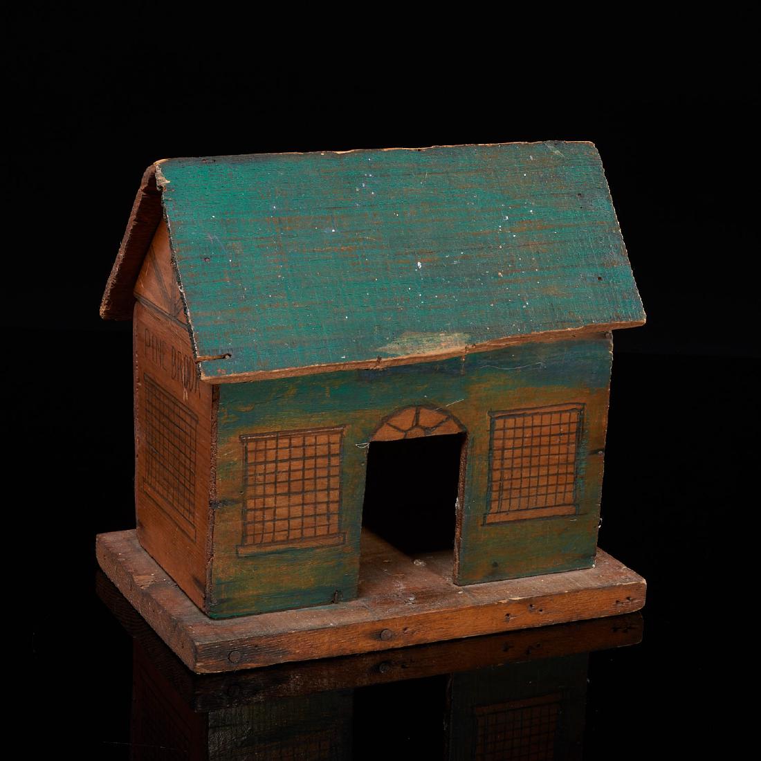 Folk Art architectural model: Folk Art architectural model, Early 20th c., American, charming painted and pencil embellished vintage prune box toy house, "Pine Brook" written across sides, 9"h x 9"w x 5"d