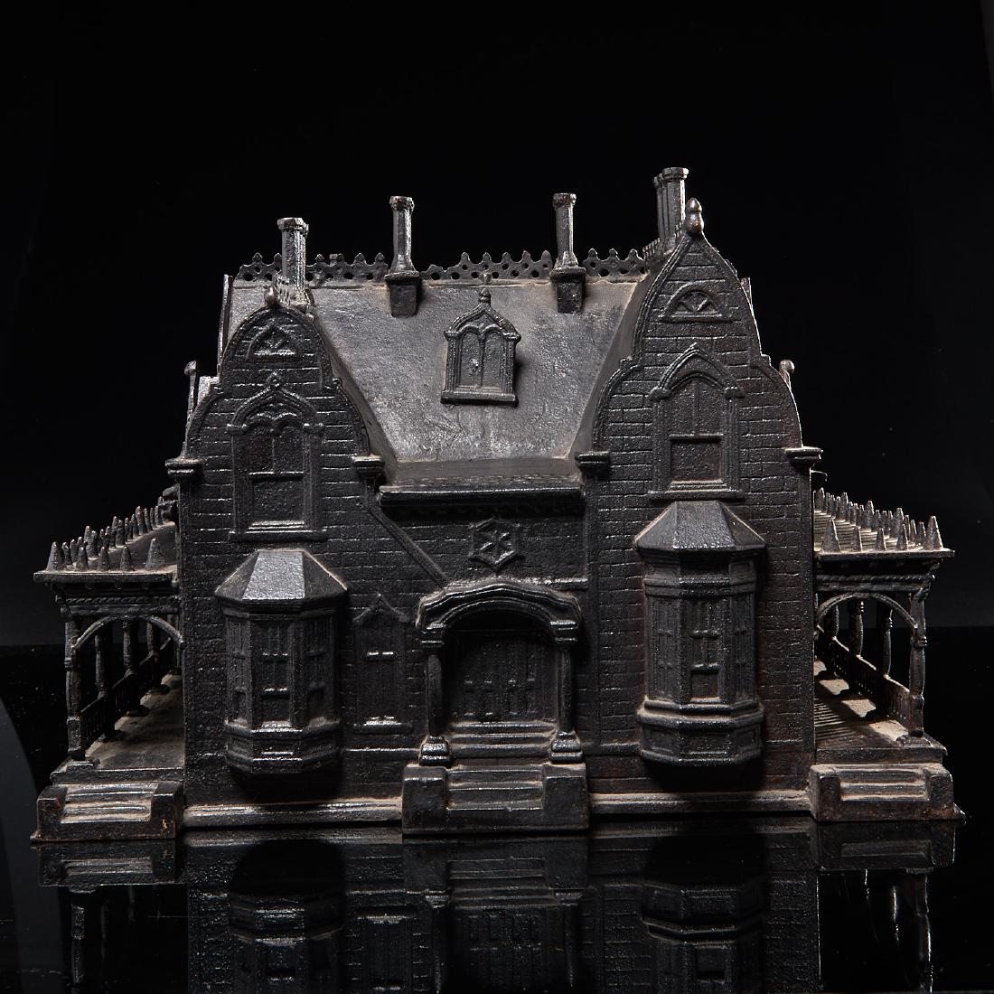 Rare Miller Iron Co. "Clifton House" birdhouse: Rare Miller Iron Co. "Clifton House" birdhouse, 19th c., American, black painted cast iron model of the "Clifton house" in Roslyn, NY, featuring amazing architectural detail, made by "Miller Iron Co. 