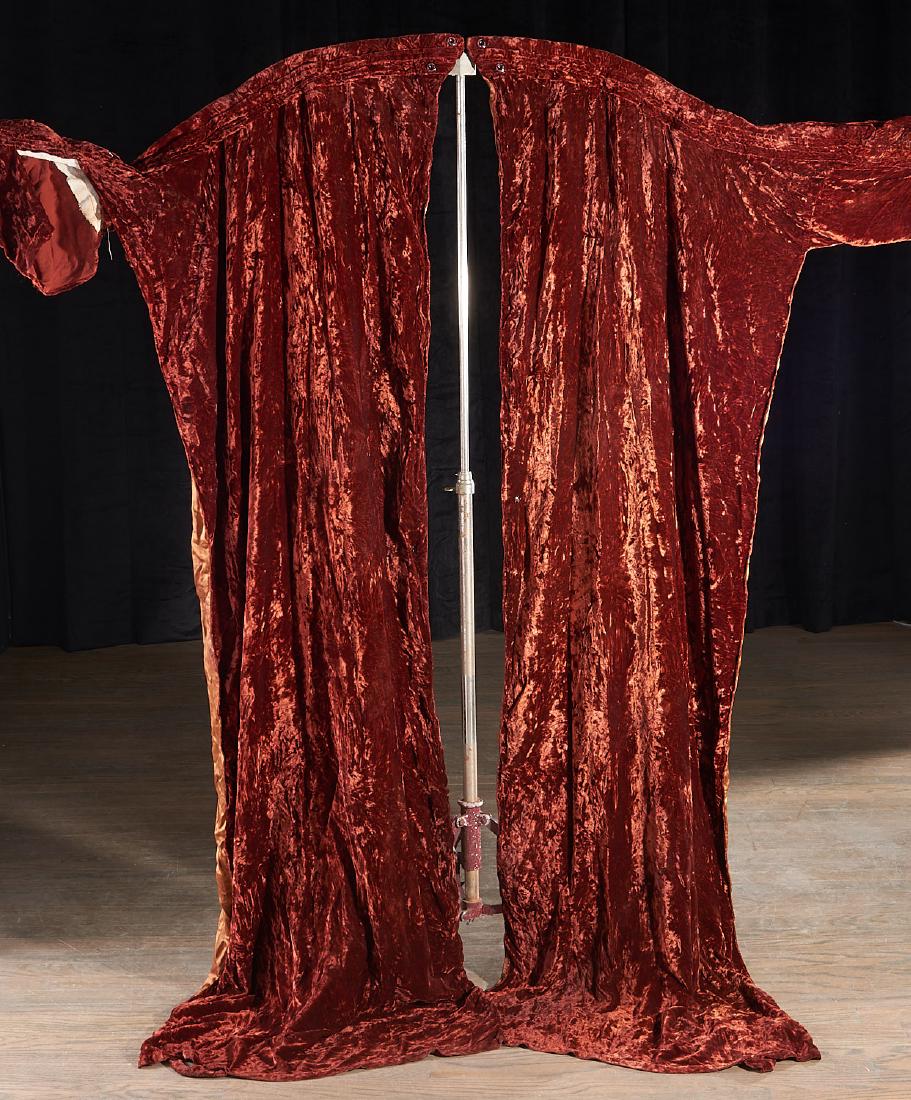 Casket display backdrop: Casket display backdrop, 19th/20th c., painted metal articulated "Landau" curves on metal tripod stand with brown velvet curtains, for use in home or travelling funeral services, 66"h x 112"w x 30"d (