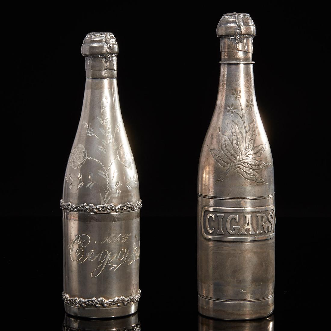 Pairpoint & Hamilton silver plate cigar humidors: Pairpoint & Hamilton silver plate cigar humidors, 20th c., modeled as champagne bottles, engraved floral and foliate decoration, Hamilton bottle monogrammed, each with factory mark to underside of foo