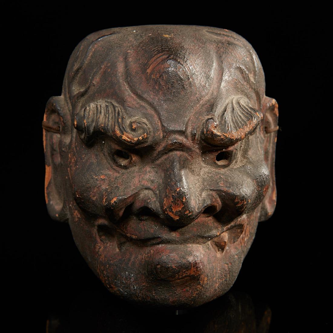 Japanese miniature Bugaku theater mask: Japanese miniature Bugaku theater mask, Possibly Edo Period, Obeshimi or Guardian Demon, carved and painted wood, faint red painted markings on verso, 4"h x 3.5"w x 2.5"d Provenance: A private New Jer