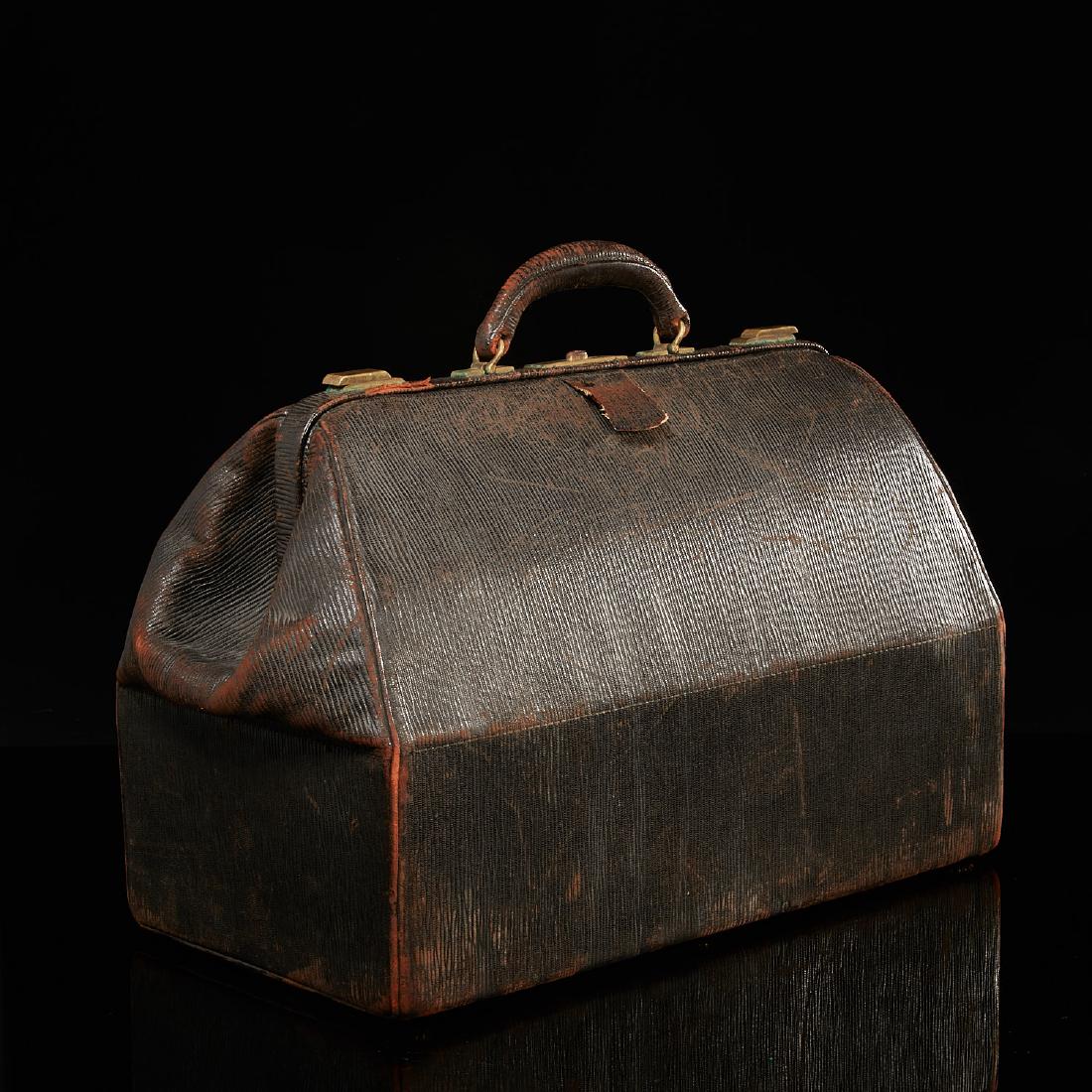 Tiffany & Co. NY leather doctor's bag: Tiffany & Co. NY leather doctor's bag, 19th/20th c., brown leather fitted interior, marked "Tiffany & Co. Makers - New York", 13"h x 22"w x 10"d Provenance: The Estate of Huguette Clark, NY.