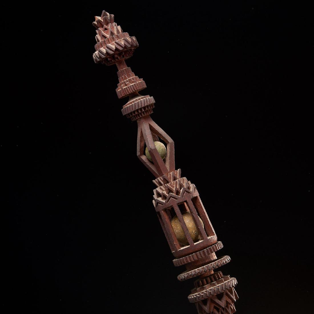 Large Antique Folk Art carved wood whimsy: Large Antique Folk Art carved wood whimsy, 19th c., multi-section puzzle carving with 3 caged balls, unmarked, 23.5"h x 2.75"dia. Provenance: The Estate of Louis Beal, NY