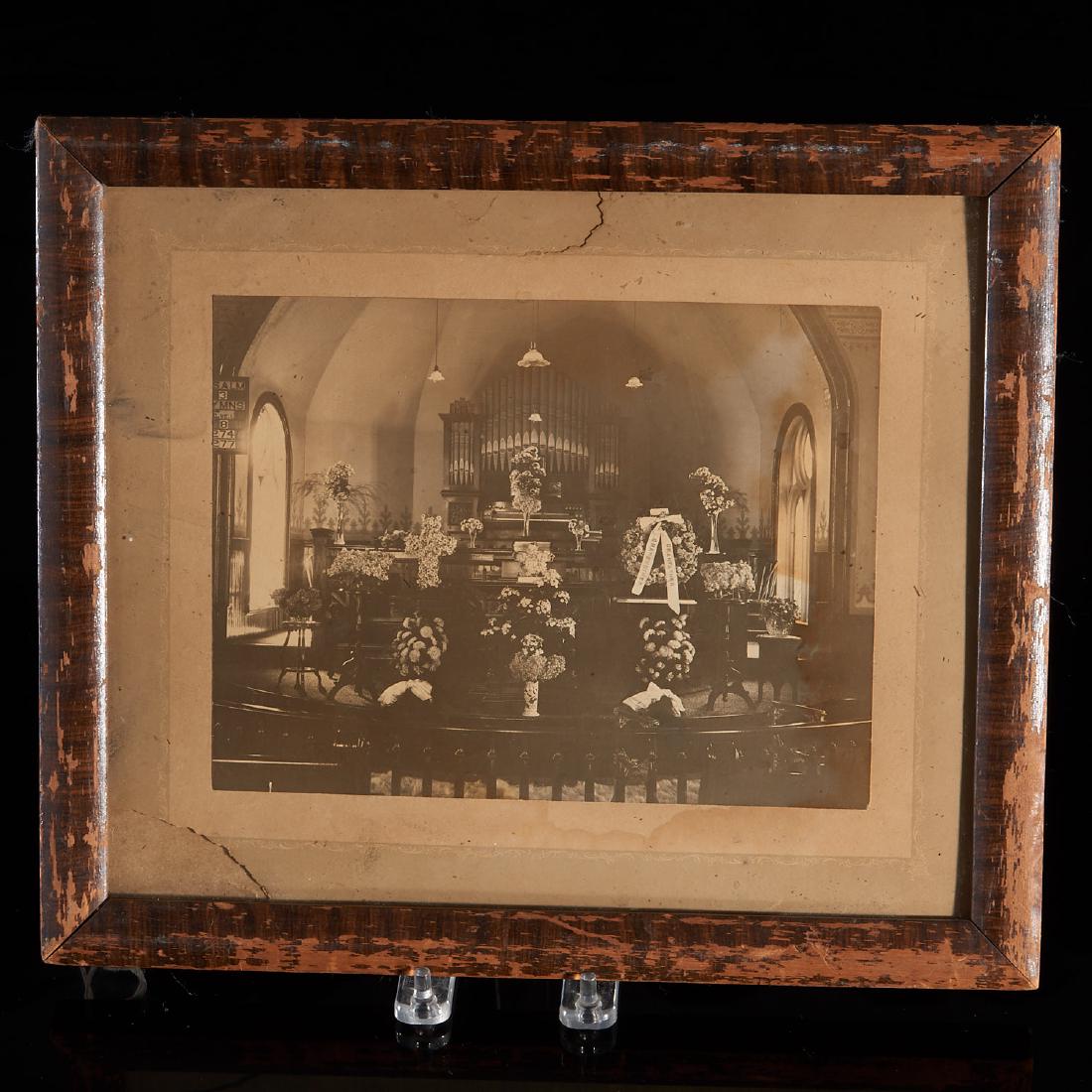 Vintage church funeral photograph: Vintage church funeral photograph, 20th c. (American), altar memento mori display with assorted floral arrangements displayed, incl. wreath with ribbons "Grandmother, Grandfather", 6.75"h x 8.75"w (ph