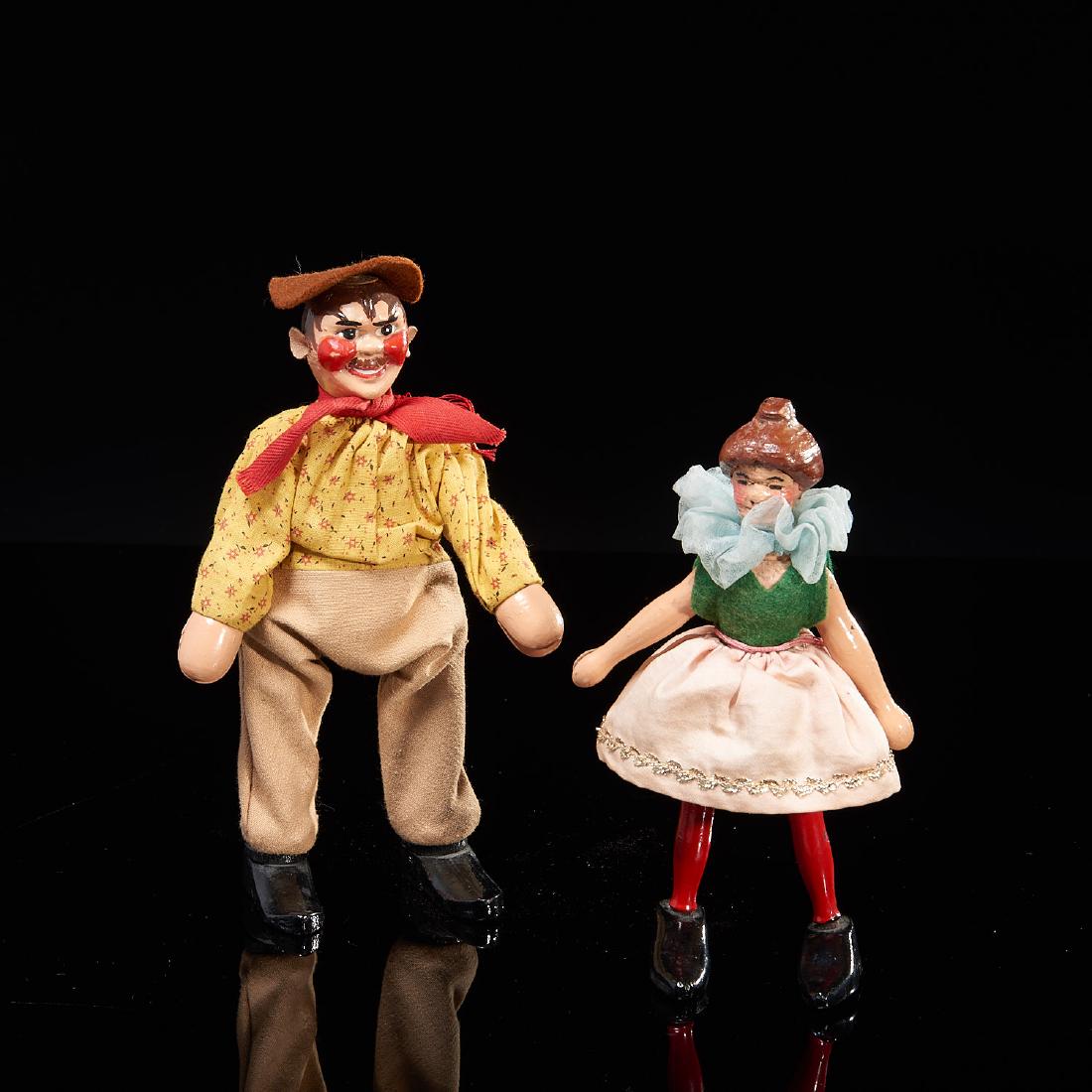 Pair Schoenhut figures: Pair Schoenhut figures, 19th/20th c., American, Philadelphia, carved, clothed, painted and articulated wood figures, depicting "hobo man" and "horse rider lady" from "Humpty Dumpty Circus", 8"h x 2"l 