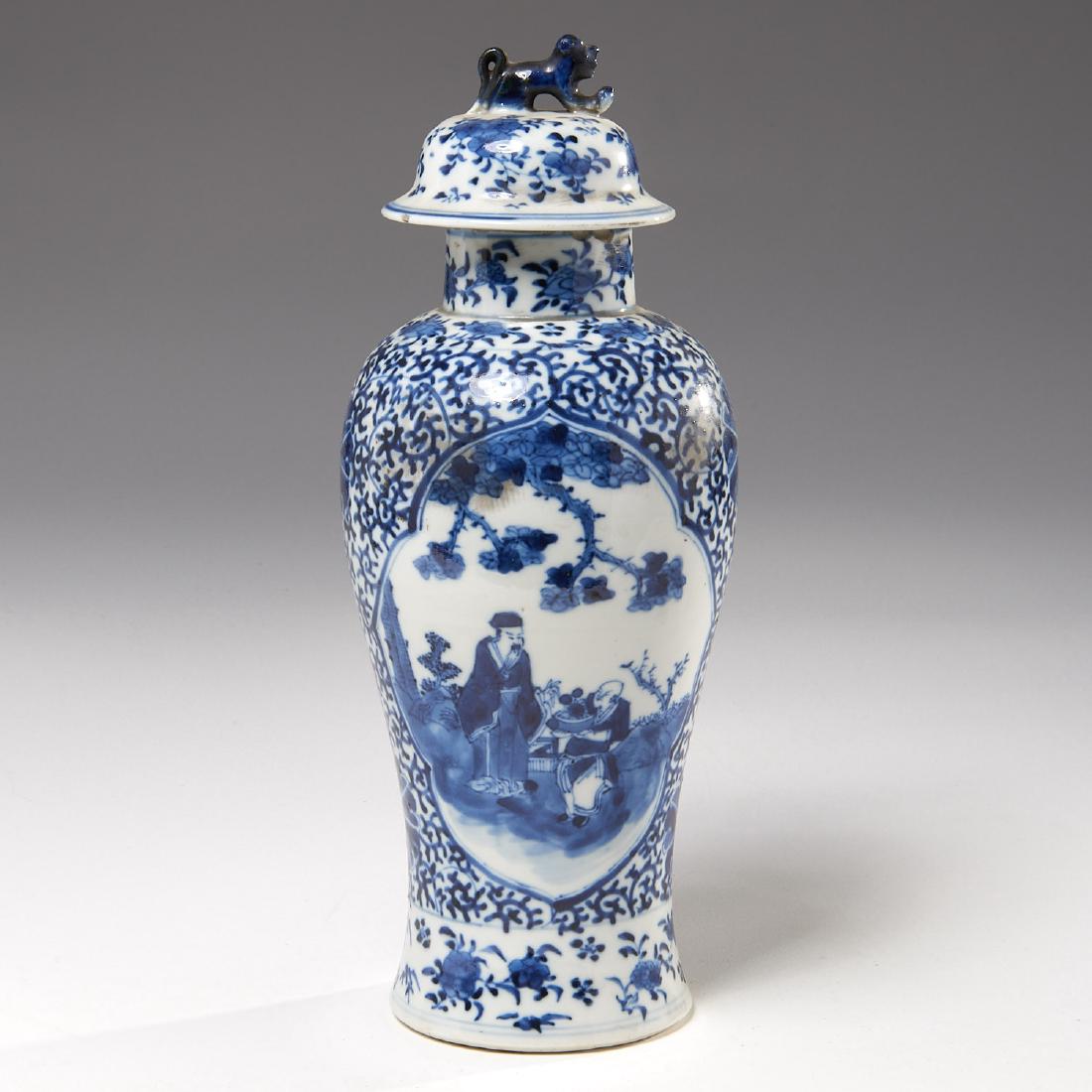 Chinese blue and white jar and cover: Chinese blue and white jar and cover, Qing Dynasty, decorated with a nobleman and servant, set on a ground of scrolling vines bearing flowers and fruit, with similarly decorated cover with Buddhist li
