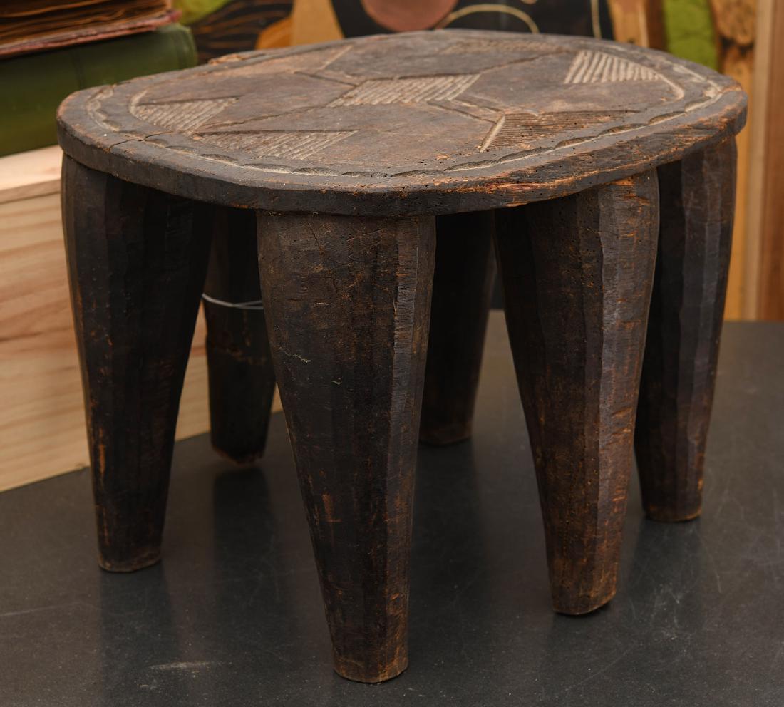 African carved six-legged stool (1 of 6)