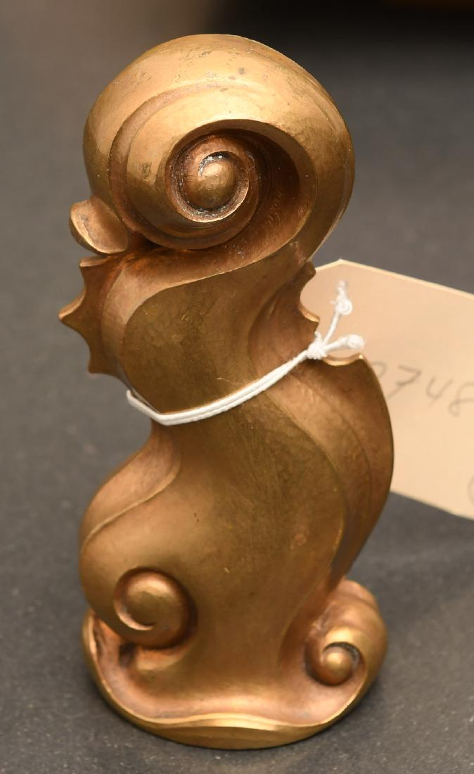 Solid bronze stylized dolphin-form seal (1 of 7)