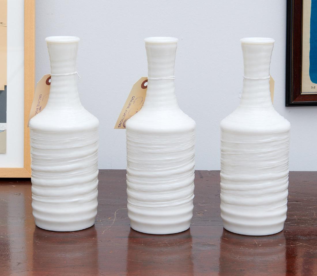 (3) Japanese textured glass sake bottles: (3) Japanese textured glass sake bottles, 20th c., raised character marks to underside of foot, 10"h