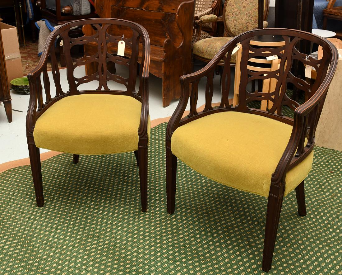 Pair mahogany pierced barrel chairs: Pair mahogany pierced barrel chairs, 20th c., unmarked, 35.5"h x 23.5"w x 21"d
