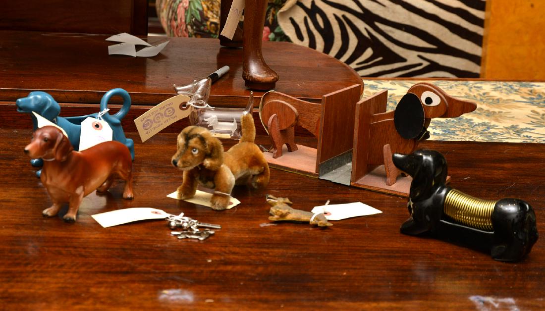 (9) Dachshund novelties incl. Steiff: (9) Dachshund novelties incl. Steiff, 20th/21st c., incl. a Steiff Hexie Dachshund, with Steiff button to reverse of ear, 4"h x 3"w x 6"l