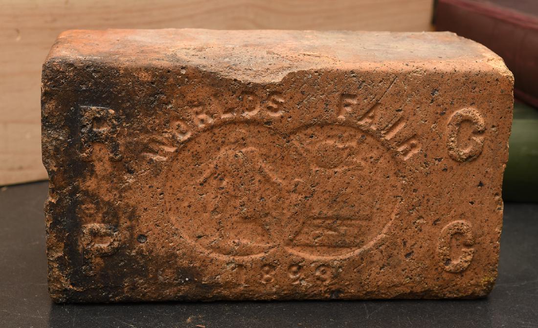 World's Fair paver brick: World's Fair paver brick, 19th c., American, imprinted brick from the 1893 World's Columbian Exhibition (Chicago World's Fair) displaying exhibition seal inset and RPCC in relief on top surface, 3.5"h