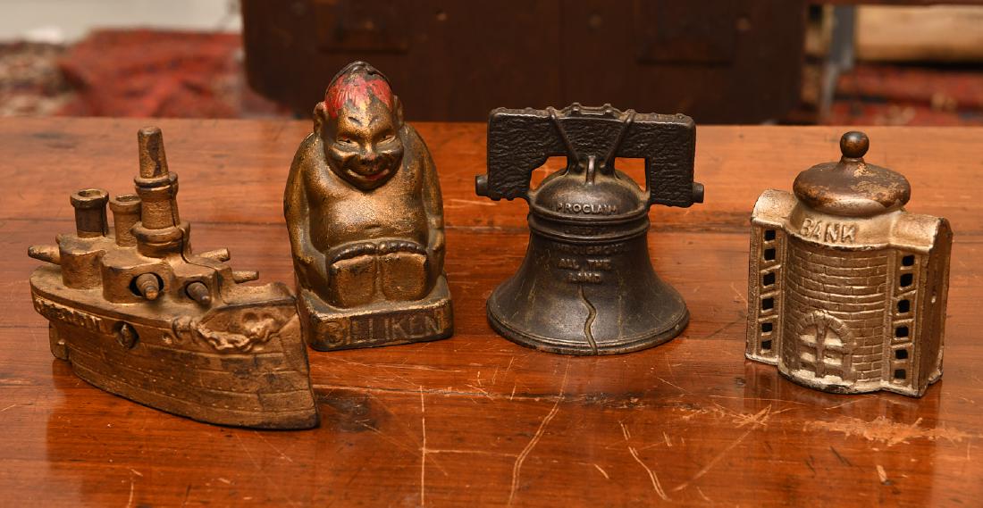 Group (4) cast iron novelty banks (1 of 9)