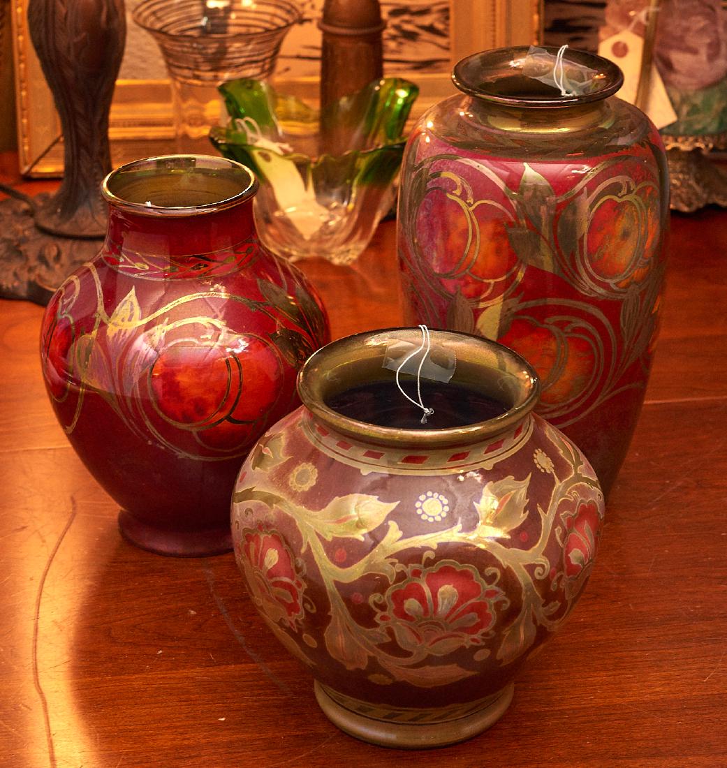 (3) Pilkington Royal Lancastrian lustre vases: (3) Pilkington Royal Lancastrian lustre vases, Early 20th c., each marked on underside, smallest: 7.75"h x 7"dia., largest: 11"h x 5.5"w Provenance: Property from a private New Jersey Collection