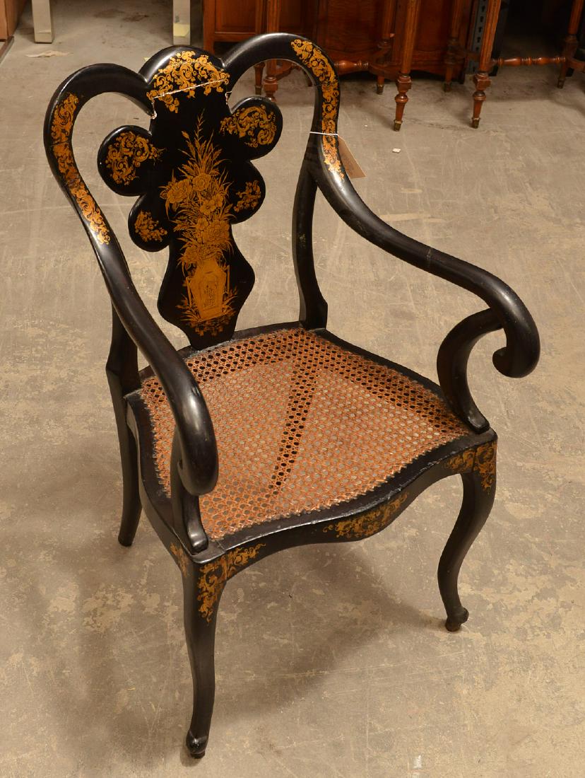 Victorian Chinoiserie gilt and ebonized armchair: Victorian Chinoiserie gilt and ebonized armchair, 19th/20th c., probably English, caned seat, 35.75"h x 21.5"w x 17.75"d, 17.5"h (to seat)