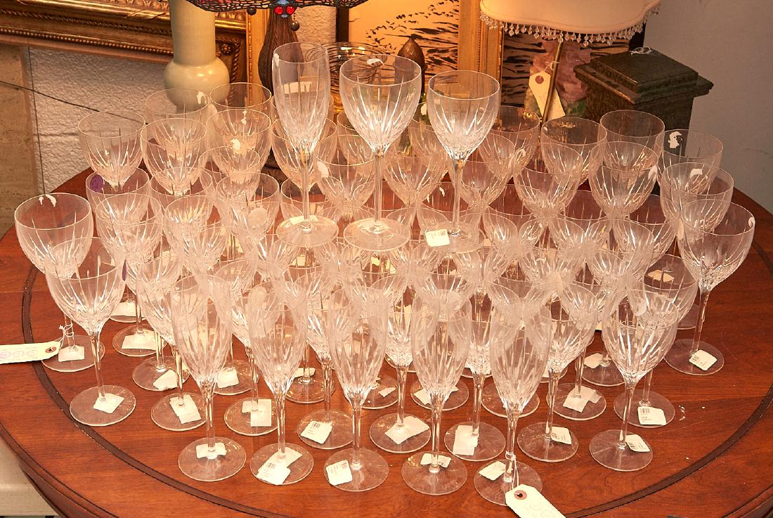 Extensive collection of (63) cut glass stemware: Extensive collection of (63) cut glass stemware, 20th c., incl. (34) white wine glasses, (23) red wine glasses, and (6) champagne flutes, largest: 9"h, smallest: 7.75"h