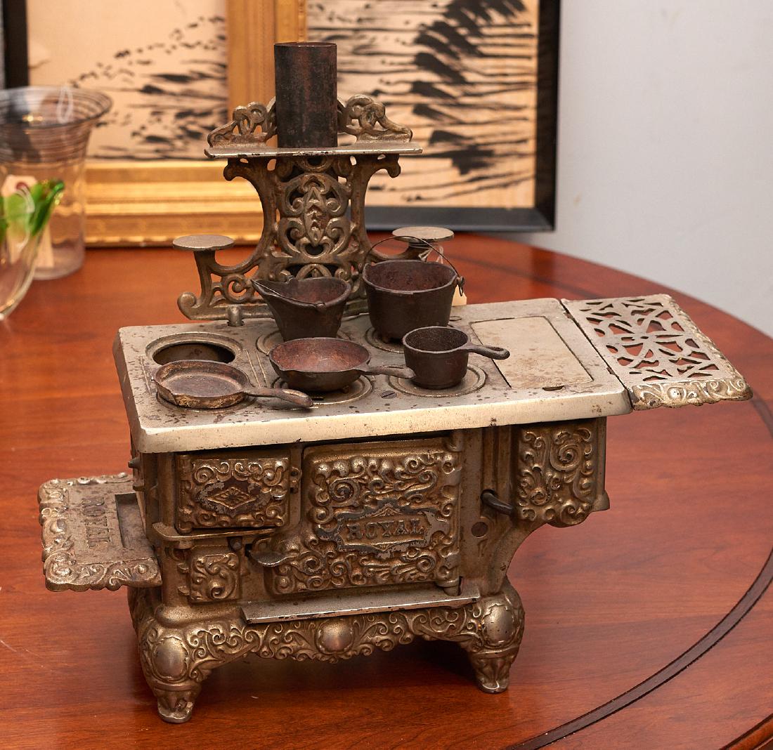 Royal child's embossed cast iron toy stove (1 of 10)