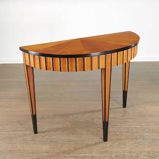 Biedermeier style demi-lune console table: Biedermeier style demi-lune console table, 20th c., possibly David Linley, satinwood with black ebonized trim, fluted frieze on tapered legs, 32.5"h x 44"w x 19.25"d Provenance: Estate of Arnold Scaas