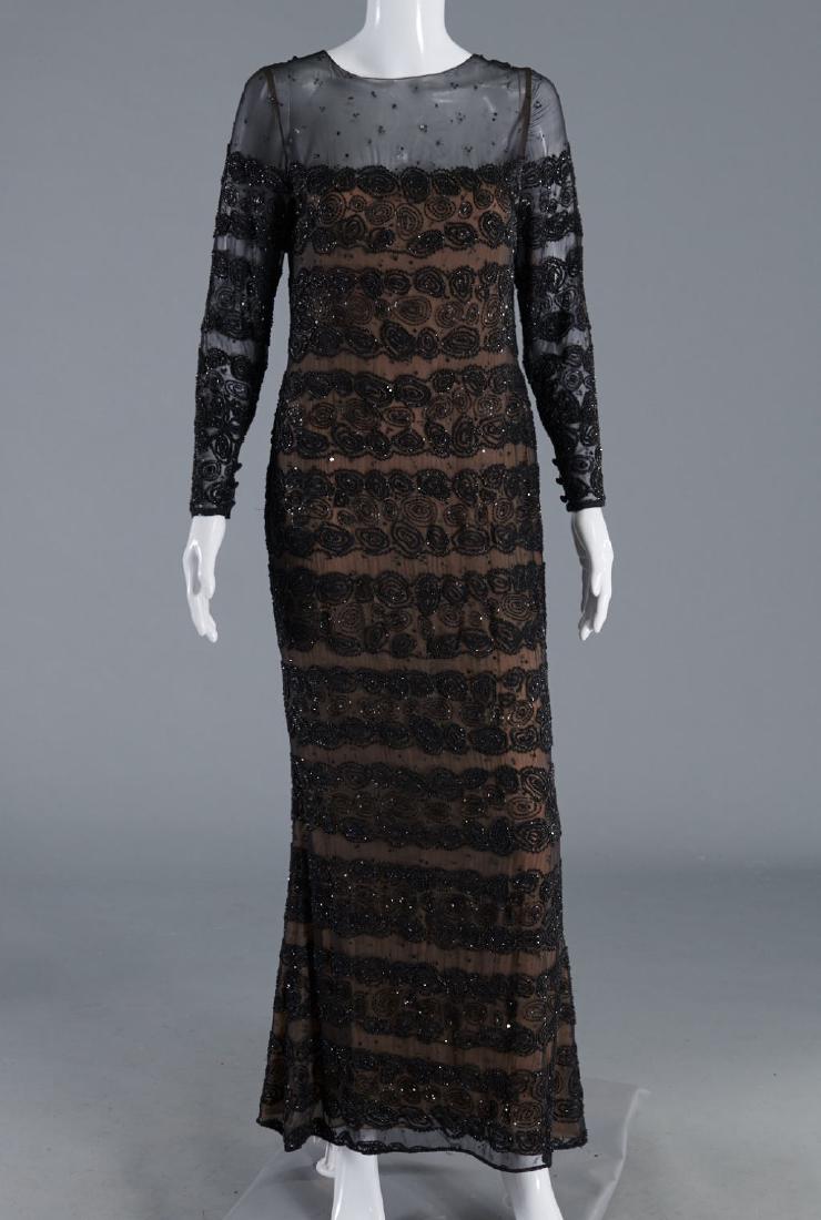 Bill Blass sheer black gown with beading: Bill Blass sheer black gown with beading, c. 1970's, black heavily beaded sheer dress with nude underlay, button detail to sleeves, size 6, approx. 34."b, 15"sh, 29"w, 22"sl, 55"l Provenance: From a 9