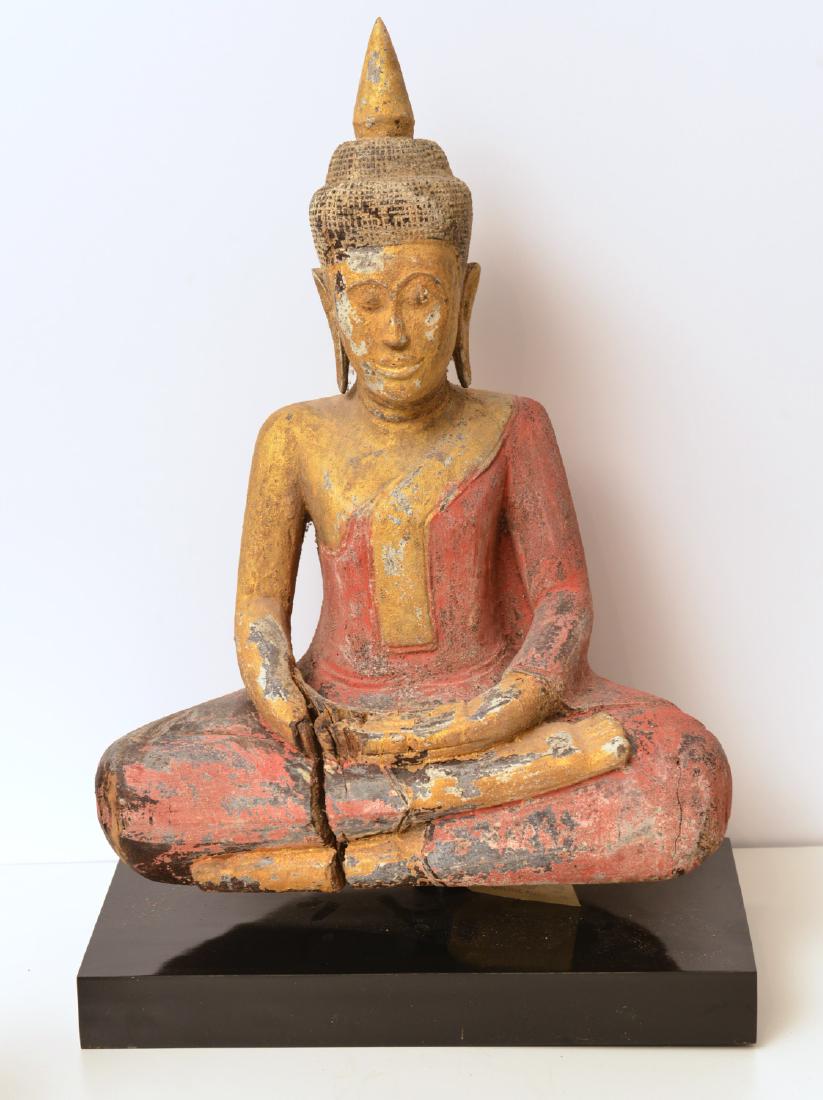 Thai carved and polychromed wood Bodhisattva: Thai carved and polychromed wood Bodhisattva, 19th/20th c., on black veneer stand, 23"h x 15.5"w x 8"d