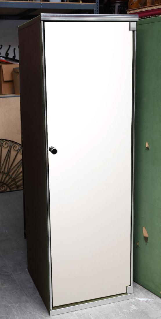 I4 Mariani for Pace mirrored wardrobe cabinet: I4 Mariani for Pace mirrored wardrobe cabinet, 20th c., designed by Guido Faleschini, green upholstered exterior with chromed metal piping and hardware, mirrored fronts, brown upholstery lined interio
