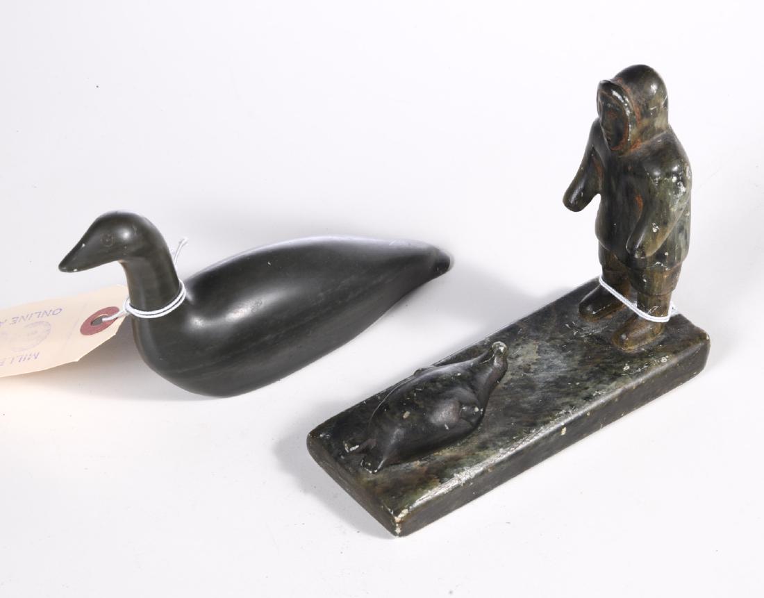 (2) Artist signed carved stone inuit figures (1 of 8)
