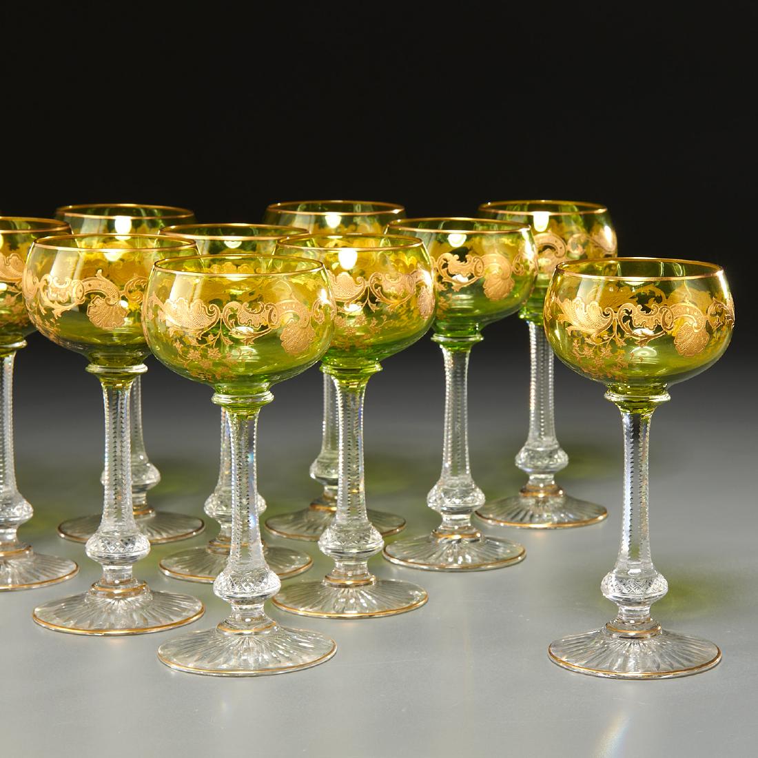 (11) Bohemian green stemware wine glasses: (11) Bohemian green stemware wine glasses, 19th/20th c., Austria, gilt decorated green glass bowl, clear cut tapering stem, gilt rimmed base, 7"h x 3"dia Provenance: The Estate of a Brooklyn New York 