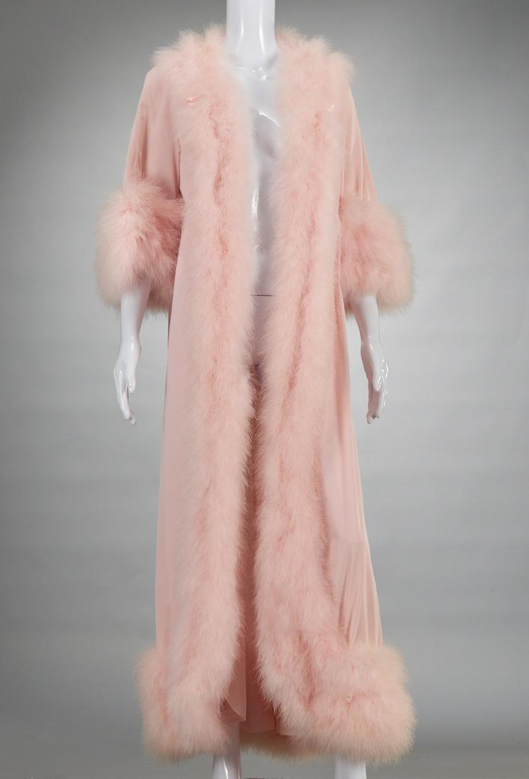 Claire Sandra by Lucie Ann Beverly Hills peignoir: Claire Sandra by Lucie Ann Beverly Hills peignoir, c. 1970's, pink nylon tricot with marabou trim, bows for Bergdorf Goodman, Size S, 52"l Notes/Literature: Founded in 1947 By Lucie Ann Anderwyzer thi