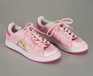 Adidas Stan Smith Miss Piggy sneakers: Adidas Stan Smith Miss Piggy sneakers, 2000's, limited edition in pink leather, with Adidas logo and graphics, size 6 Provenance: From a New Canaan, CT single owner clothing collection