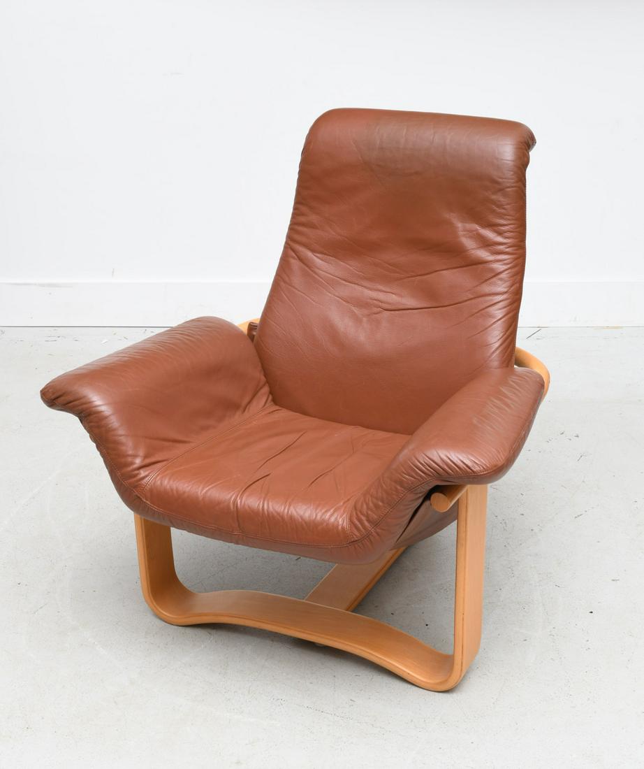 Ingmar Relling for Westnofa Manta chair: Ingmar Relling for Westnofa Manta chair, 20th c., Norwegian, loose brown leather back and seat cushions, on blonde bentwood frame, sticker label to underside, 34.5"h x 33.5"w x 20"d