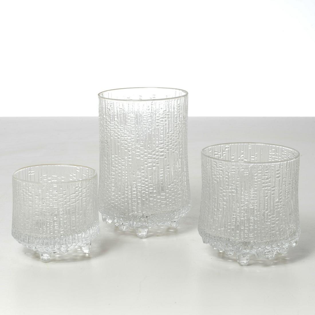 Set (24) Tapio Wirkkala for Iittala tumblers: Set (24) Tapio Wirkkala for Iittala tumblers, 20th c., Finnish, Ultima Thule pattern, incl. (8) highballs, (8) on the rocks glasses, and (8) cocktail tumblers, unmarked, 5"h x 3.25"dia (highball), 3.5