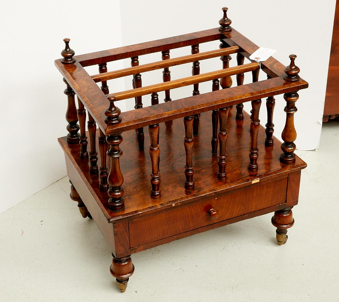Victorian burl walnut canterbury: Victorian burl walnut canterbury, 19th c., English, having spindle dividers and finials, with single lower drawer, on casters, 21.5"h x 20.5"w x 16"d