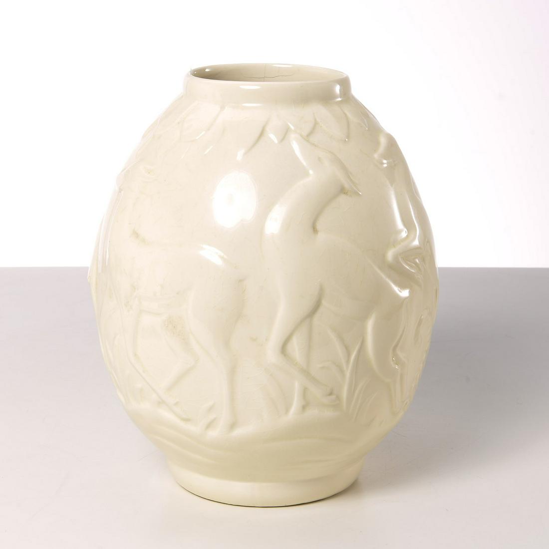 Boch Freres Art Deco vase: Boch Freres Art Deco vase, 20th c., Belgian, deer in relief, factory stamp to underside of foot, 10"h x 8.5"w Provenance: Property removed from 1240 Park Avenue, NYC