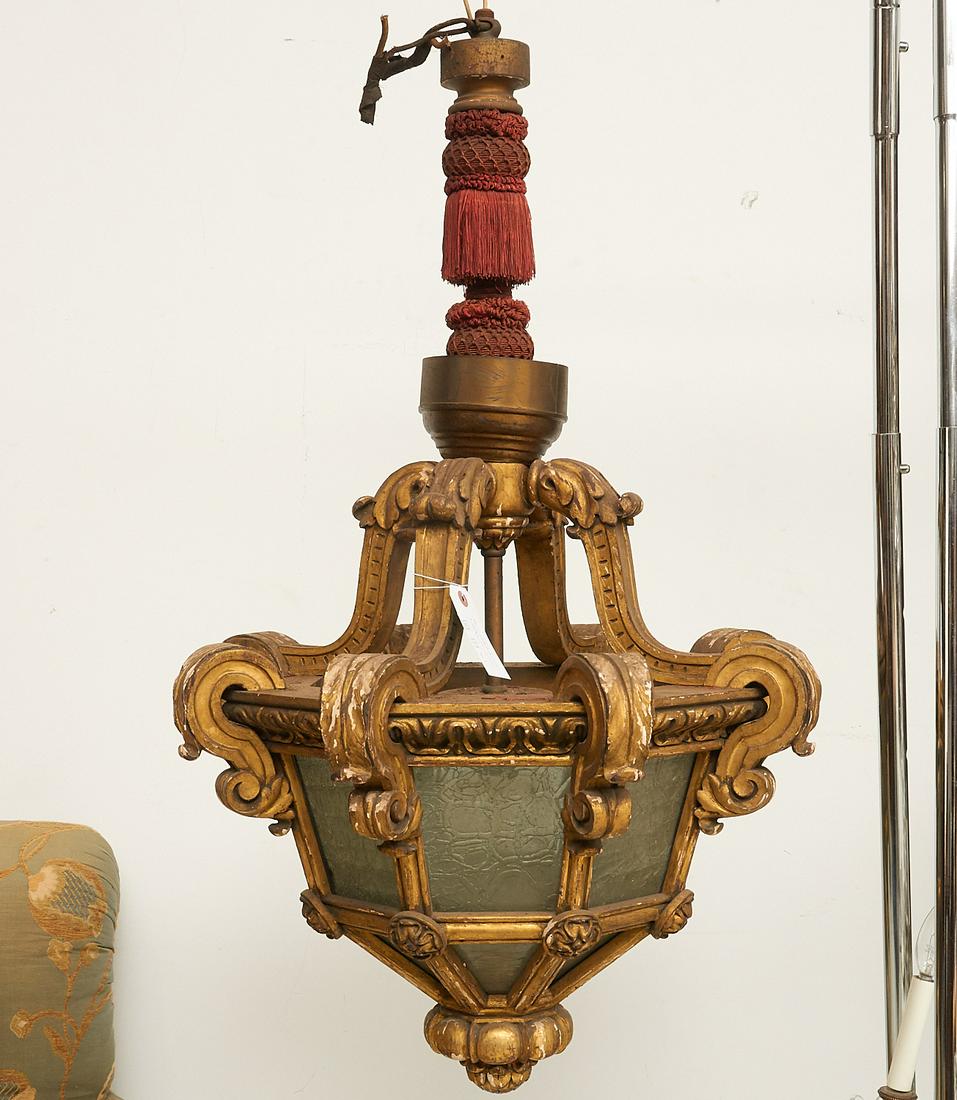 Italian Baroque style giltwood lantern chandelier: Italian Baroque style giltwood lantern chandelier, Early 20th c., 6-lights, carved acanthus leaf scrolled arms, floret medallions, acorn drop, cranberry tassel fringe decoration to baluster pole, unma