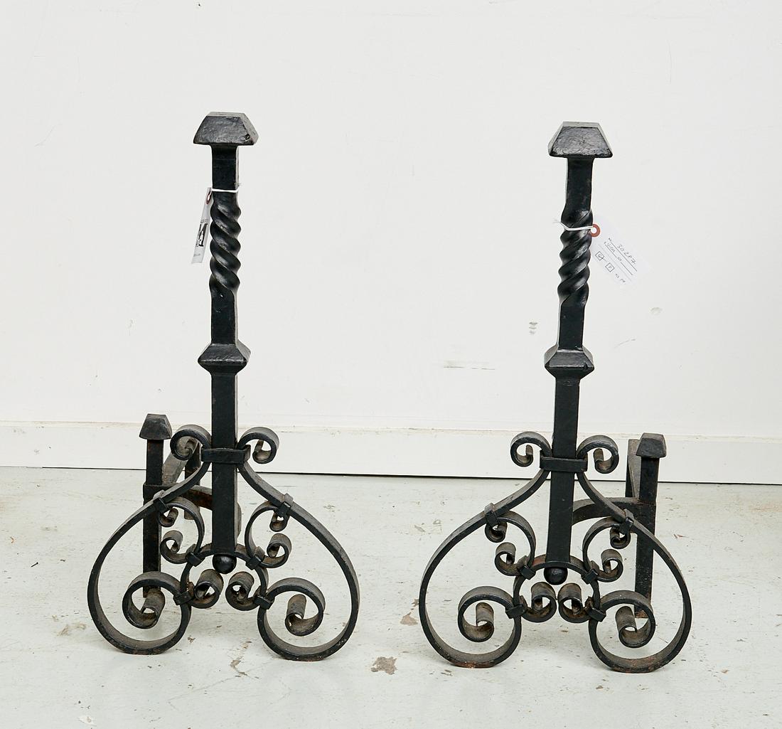 Pair Samuel Yellin style wrought iron andirons: Pair Samuel Yellin style wrought iron andirons, 20th c., Arts and Crafts style black painted wrought iron andirons, scrolled form, unmarked, 24.5"h x 12"w x 18.75"d