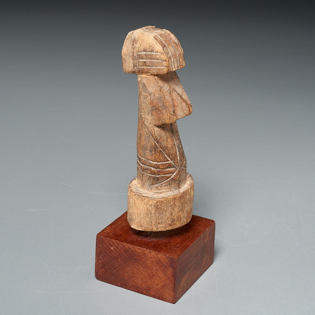 Mossi "yariga biiga" fertility doll, ex-museum: Mossi "yariga biiga" fertility doll, ex-museum, 20th c., Burkina Faso, carved wood, depicting an abstracted nude female form, mounted on wood display, 5.5"h (doll) Provenance: Deaccessioned works bene