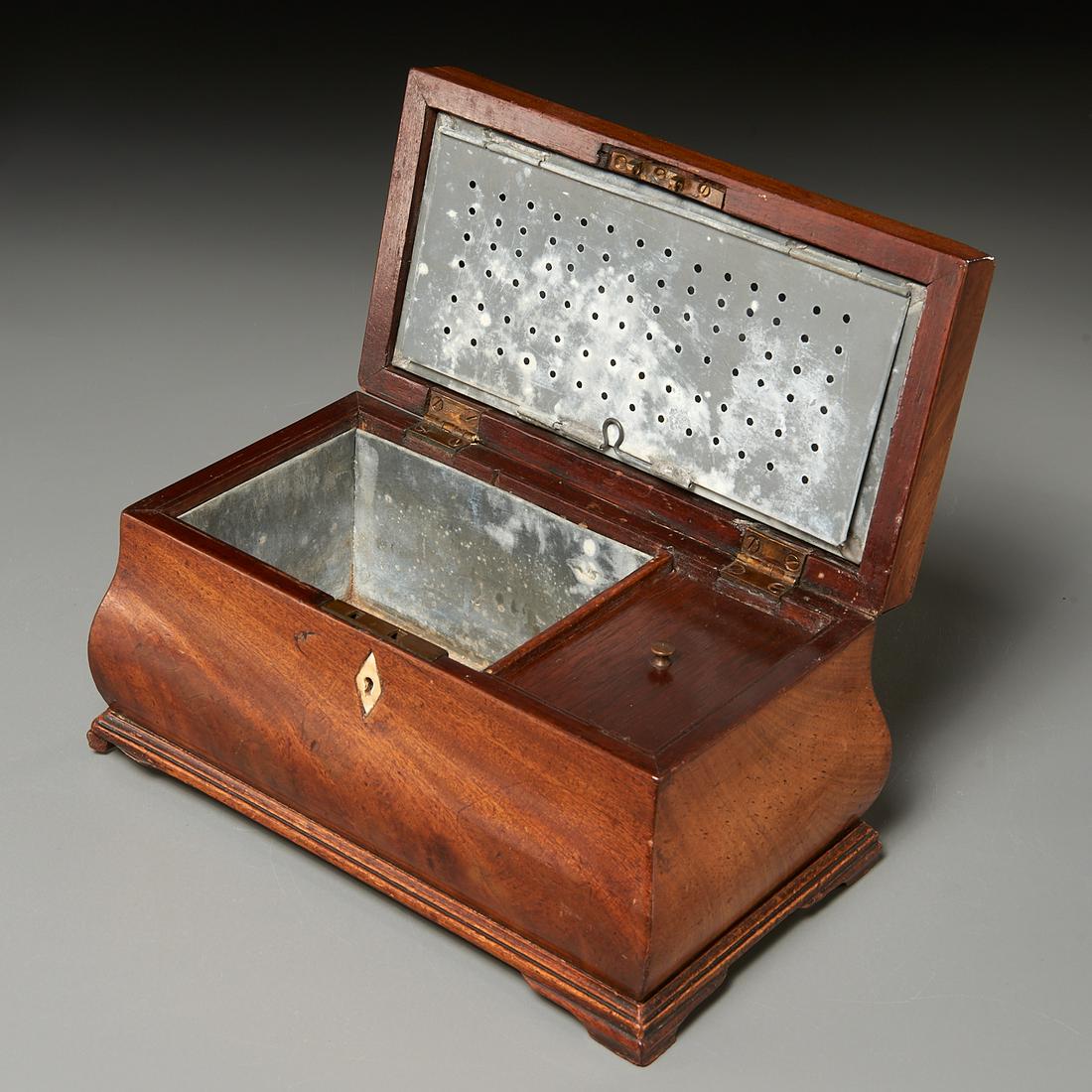 George III mahogany tea caddy converted to humidor: George III mahogany tea caddy converted to humidor, 18th/19th c. and adapted, casket-form box with brass handle and bracket feet, the lidded top opens to double tin-lined lidded wells, the inner lid r