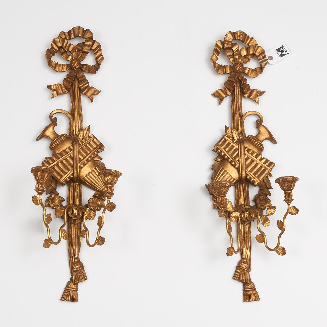Pair Louis XVI style giltwood wall sconces: Pair Louis XVI style giltwood wall sconces, 20th c., Italian, 2-arm, ribbon and tassel with ewer decoration, candle sconces, stamped "Made in Italy" verso, 29.25"h x 8"w