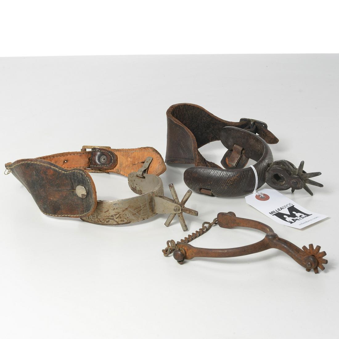 (3) Antique Western & Mexican spurs: (3) Antique Western & Mexican spurs, 19th/20th c., includes one marked "Zacatecas" with horse design, 6 point rowel; one heavy iron with 8 point rowel and possibly silver decoration at front of leathe