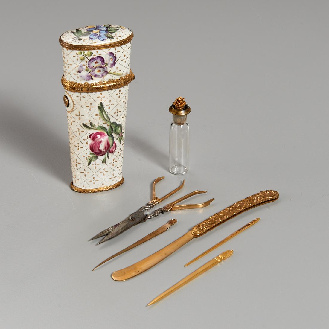 South Staffordshire Enamel and Gilt Metal Etui: South Staffordshire Enamel and Gilt Metal Etui, c. 1780, of tapering oval form with repousse flower decoration and gilt diaper on a white ground, the hinged cover opening to reveal a fitted interior w